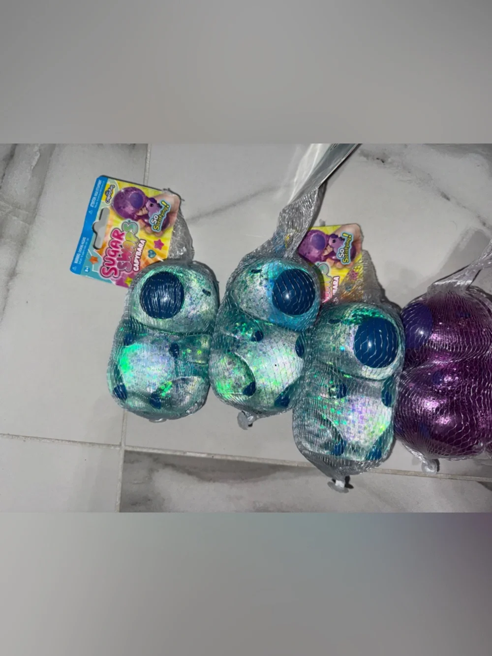 Sugar swaps Glitter Squishes capybaras  - Blue, Purple & Pink Sensory Toy